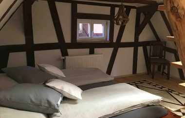 Schlafzimmer 3 in Die Fachwerkhütte | © Die Fachwerkhütte